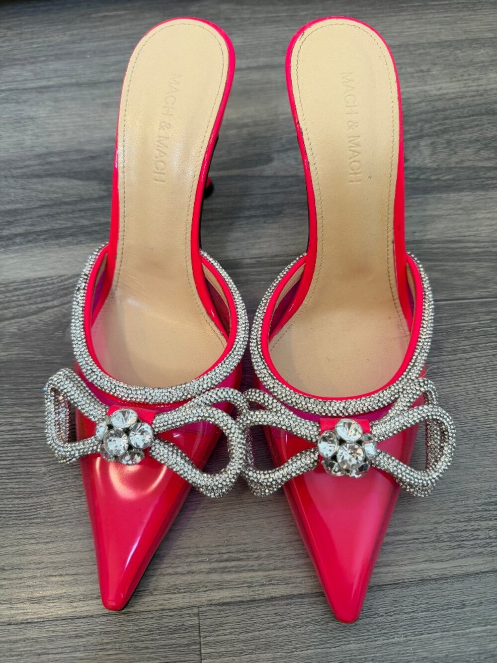 MACH & MACH Double Crystal Bow PVC Pointed Toe Mules in Pink